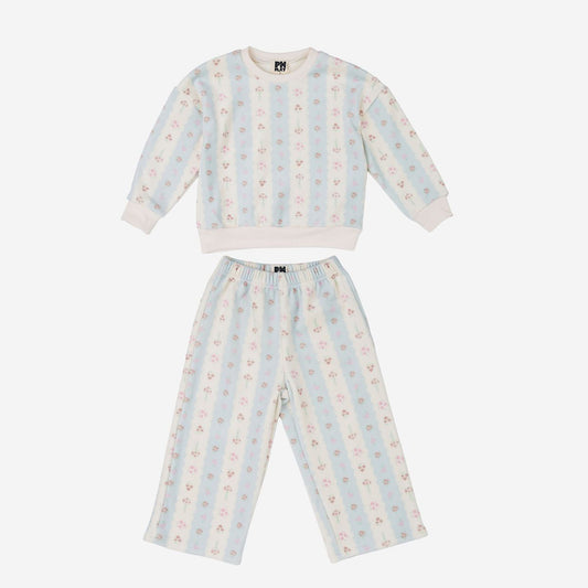 A two-piece children's pajama set consisting of a long-sleeve top and matching pants, featuring vertical light blue and cream stripes with a small pink and gold floral pattern, displayed on a light gray background.