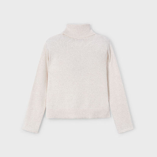 Light beige turtleneck sweater on a white background