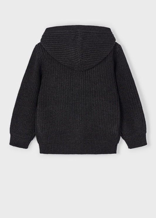 Black knitted hoodie on a light gray background