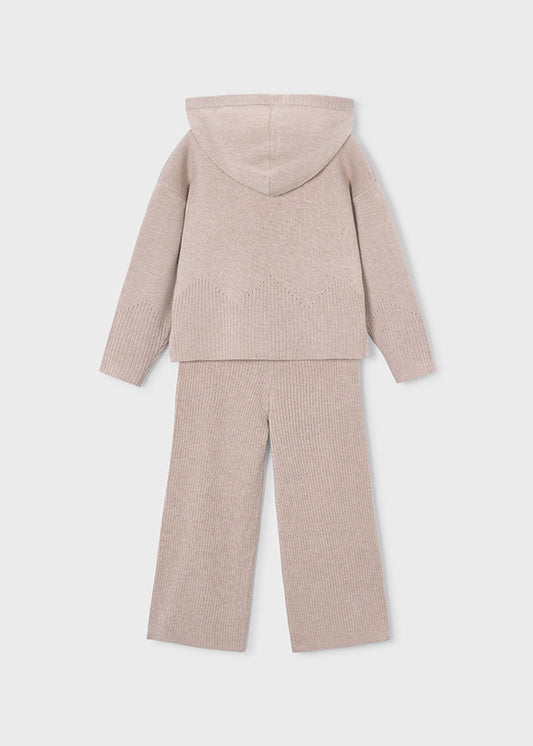 A two-piece children's knit loungewear set in a light beige color, featuring a hooded sweatshirt and matching wide-leg pants, shown from the back on a light gray background.