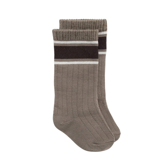Pair of brown socks with a black stripe on a white background