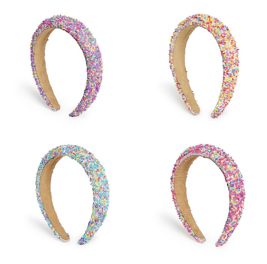 Four colorful headbands with a white background
