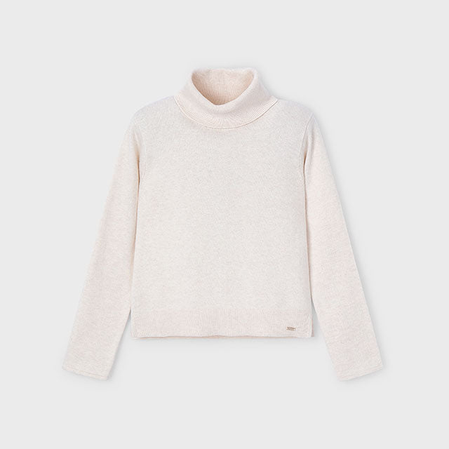 Oat turtleneck sweater on a light gray background