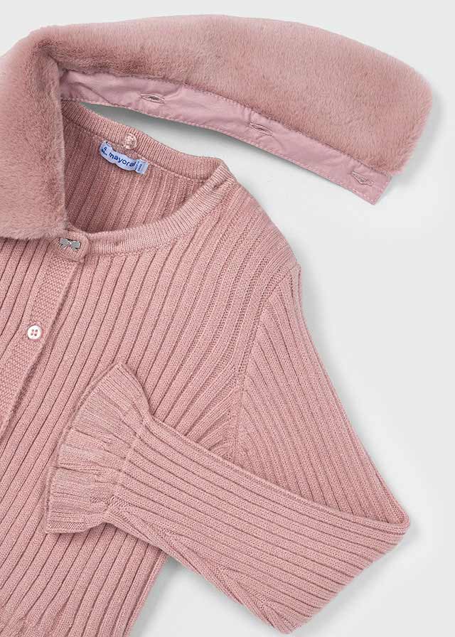 Pink ribbed cardigan with removable faux fur collar on a light gray background