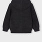 Black knitted hoodie on a light gray background
