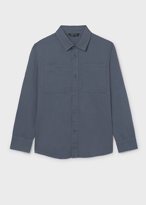 Blue button-up shirt on a light gray background