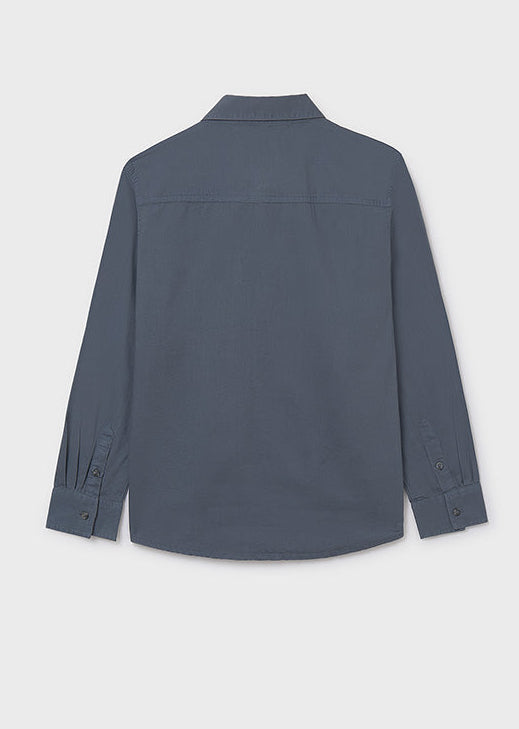 Blue shirt on a light gray background