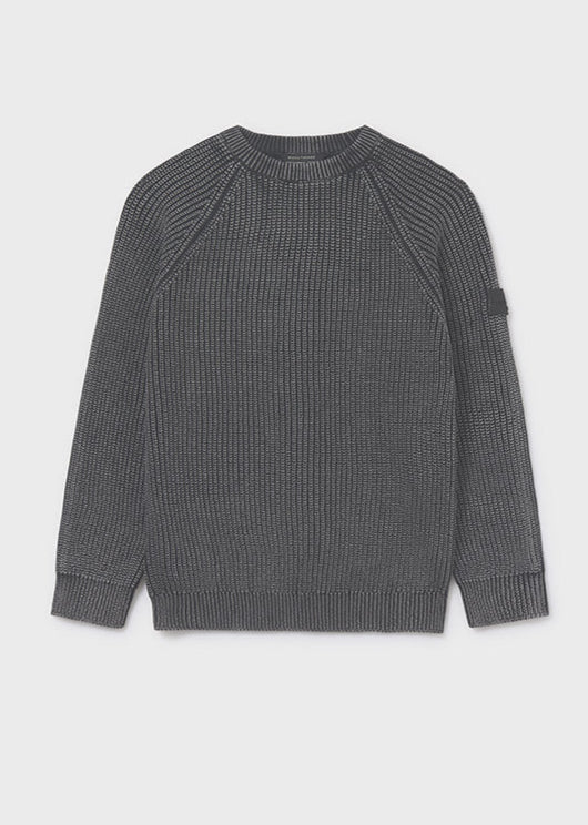 Gray ribbed sweater on a light gray background