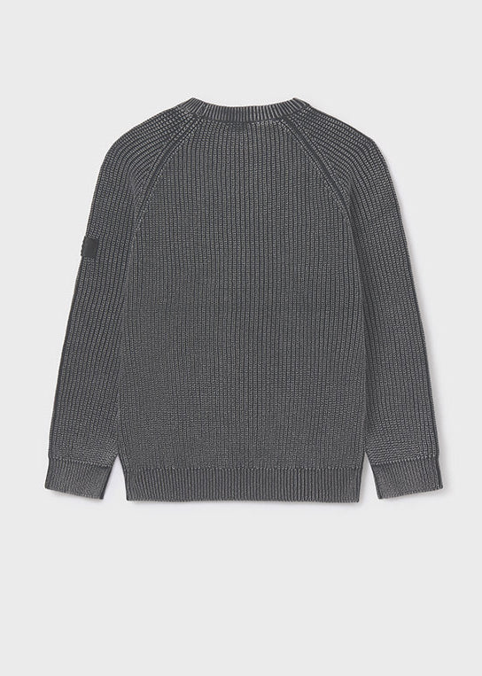 Gray ribbed sweater on a light gray background
