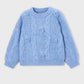 Blue knitted sweater with floral patterns on a light gray background