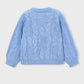 Blue knitted cardigan on a light gray background