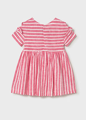 Pink and white striped dress on a light gray background