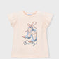 Pink t-shirt with cowboy boot design and 'Howdy!' text on a light gray background