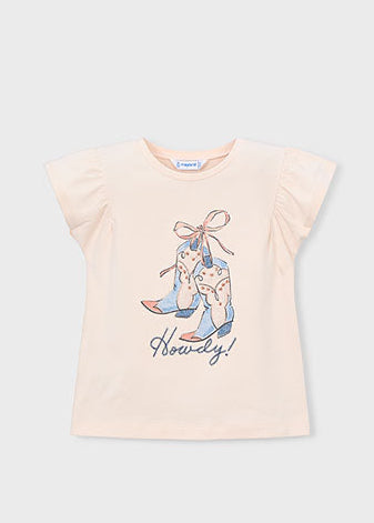 Pink t-shirt with cowboy boot design and 'Howdy!' text on a light gray background