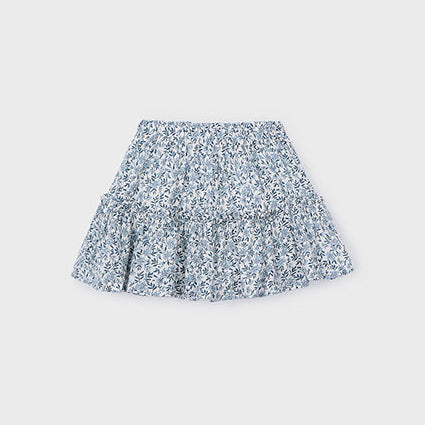 Floral patterned skirt on a light gray background
