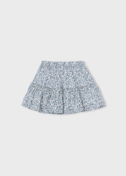Floral patterned skirt on a light gray background