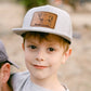 Raised in a Barn Kids Trucker Hat