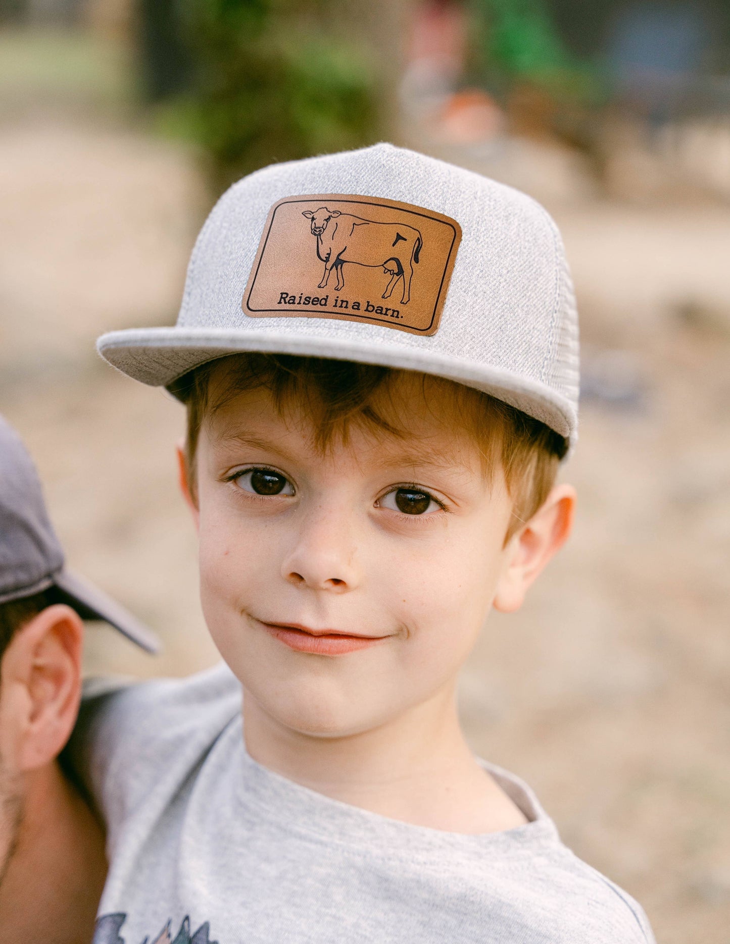 Raised in a Barn Kids Trucker Hat
