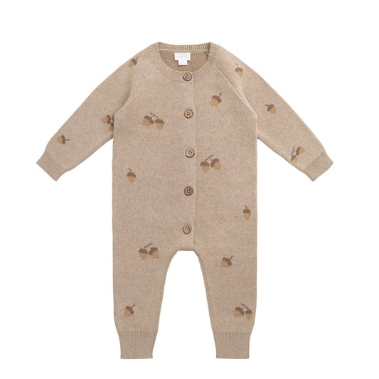 Beige baby sweater onesie with acorns detail and button details on a white background