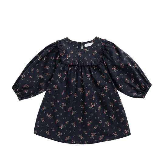 Black dress with floral pattern on a white background