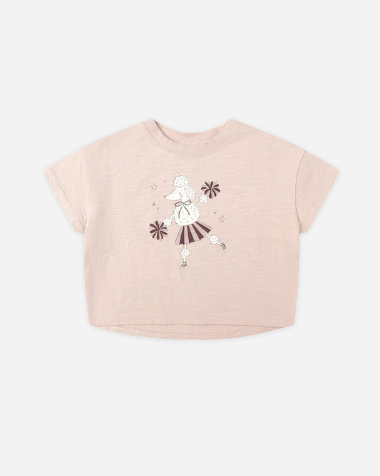 Pink t-shirt with a graphic design of a cheer leading poodle on a white background