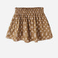 Golden brown floral-patterned skirt on a white background