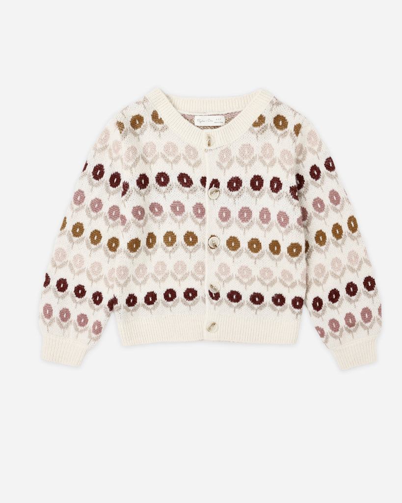 Floral patterned sweater on a white background