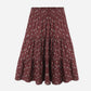 Maroon patterned skirt on a white background