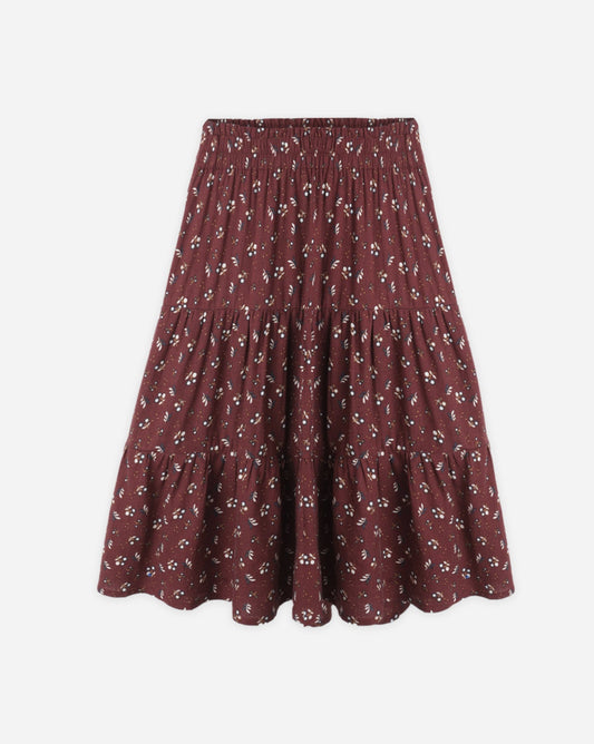 Maroon patterned skirt on a white background