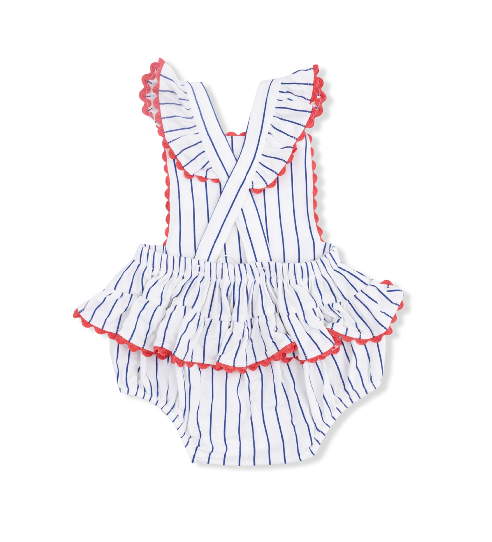 Striped baby romper with ruffled details on a white background