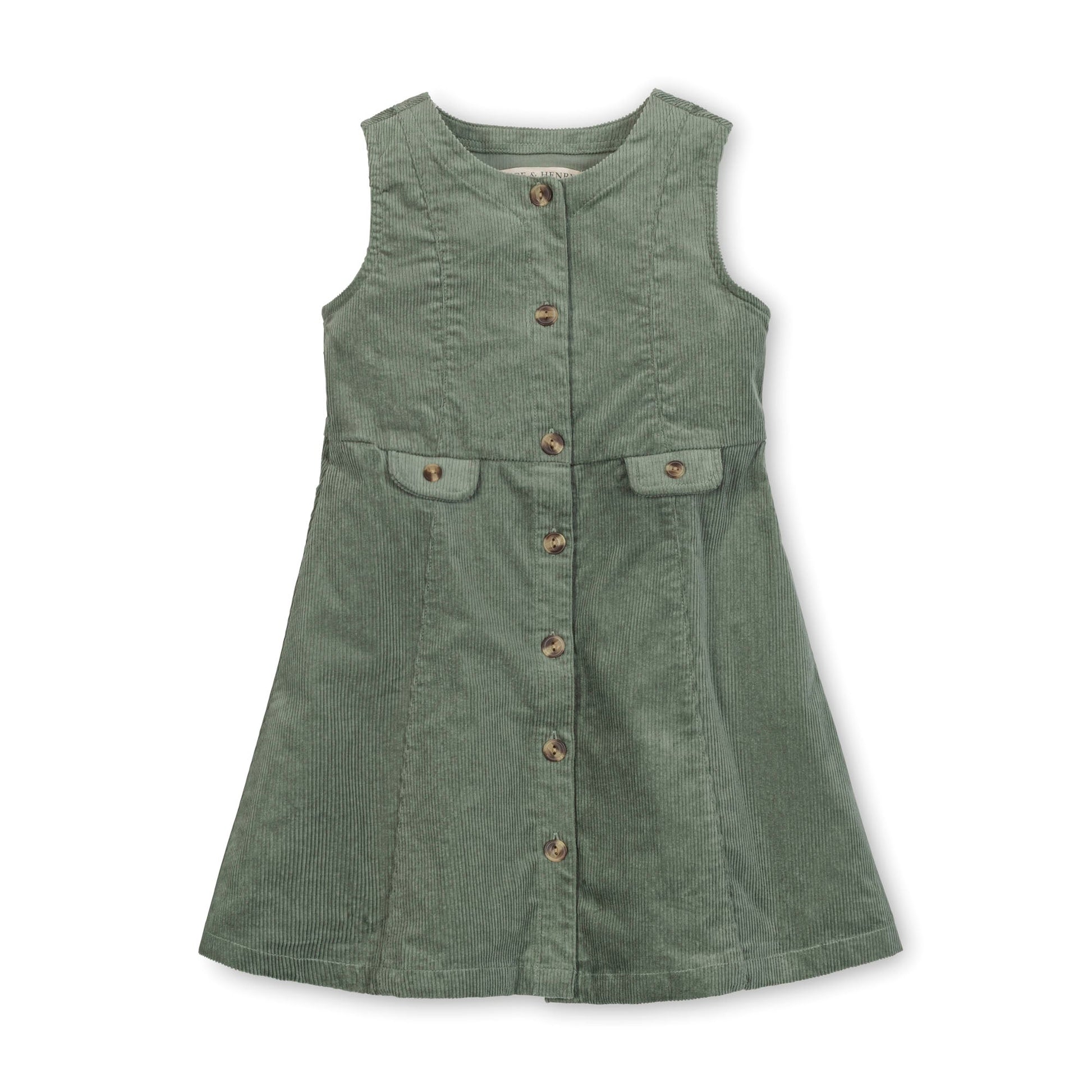 Green sleeveless dress with buttons on a white background