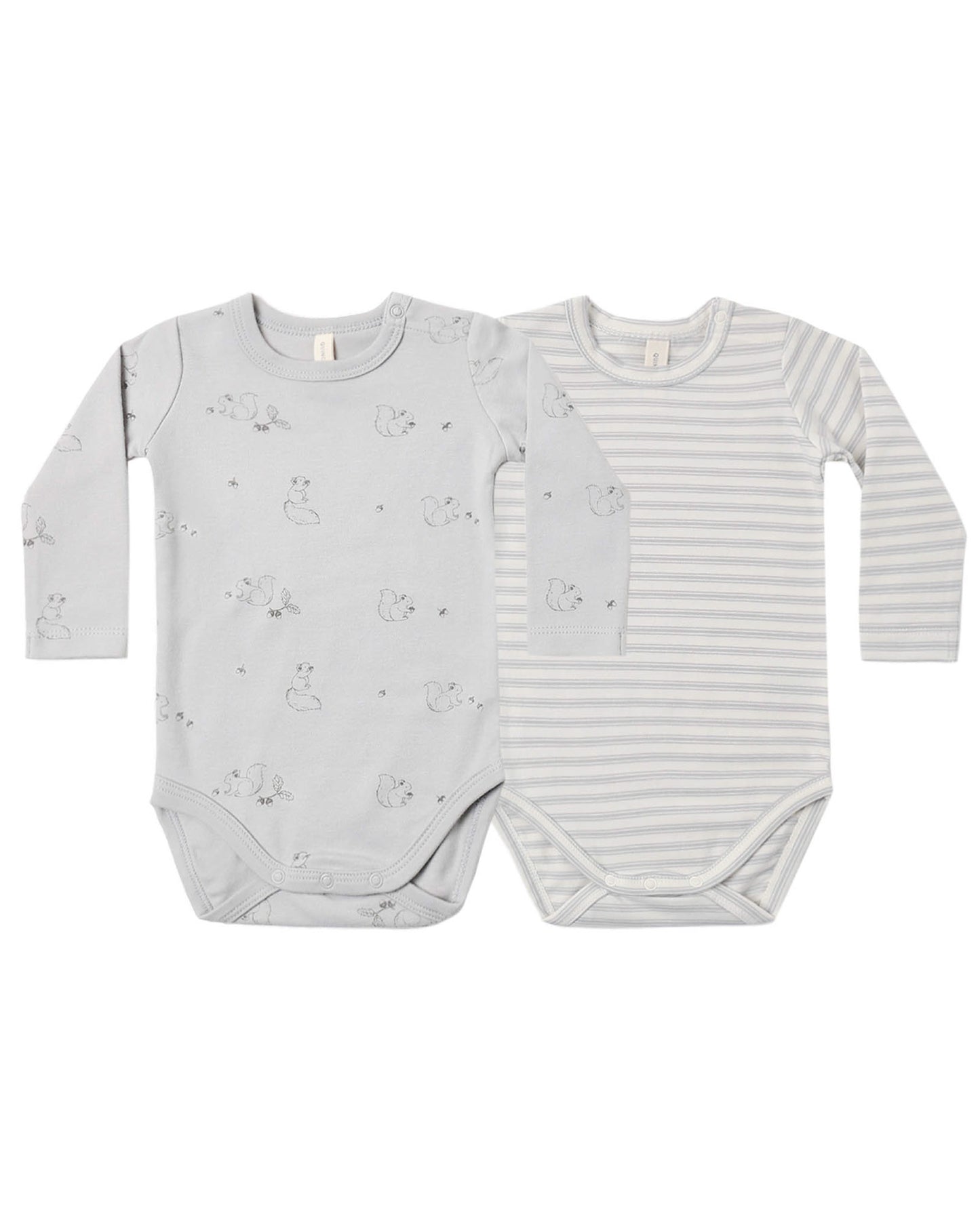 Two baby bodysuits with different patterns on a white background