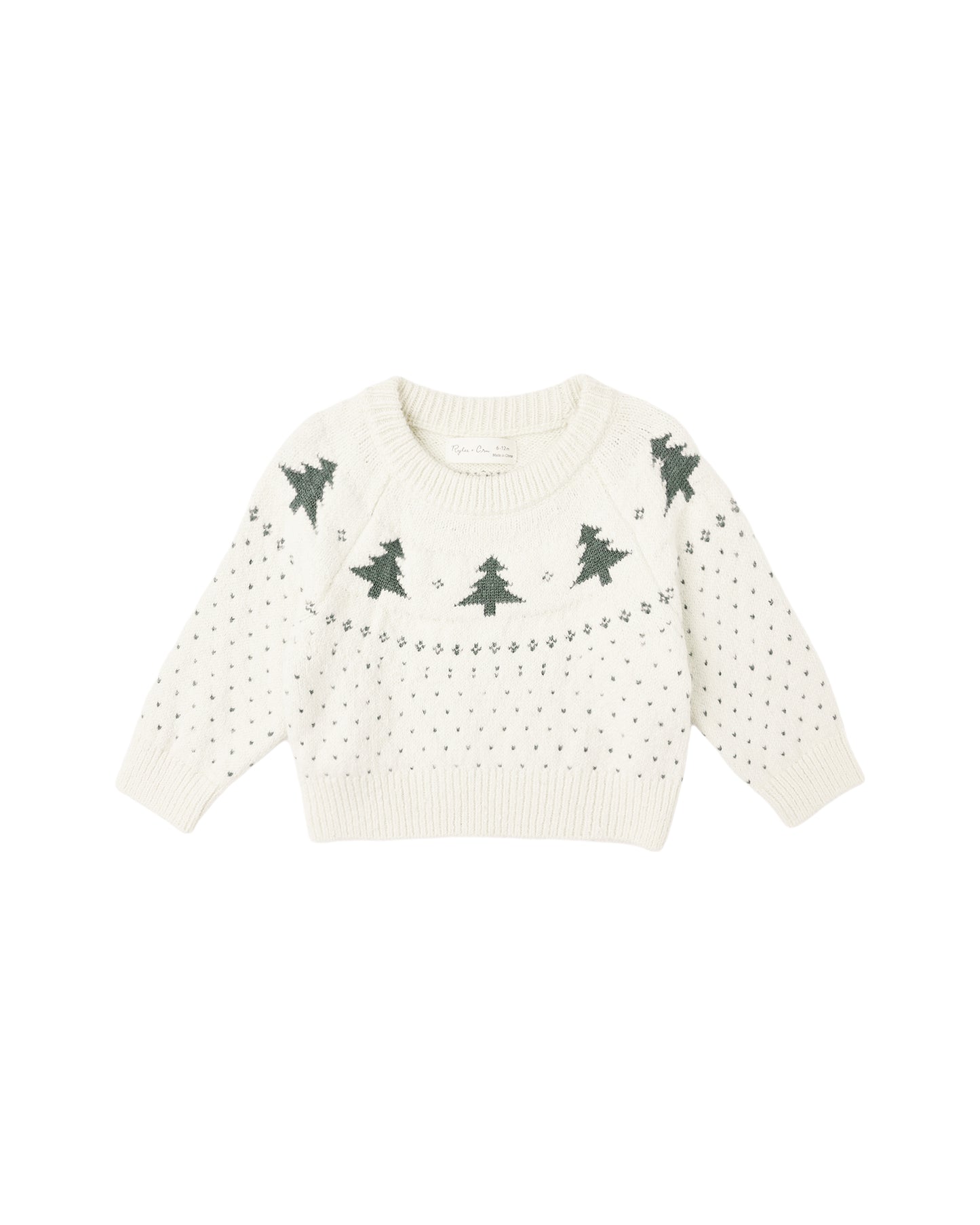 A white fair isle sweater with a pattern of green trees and dots, suitable for babies.