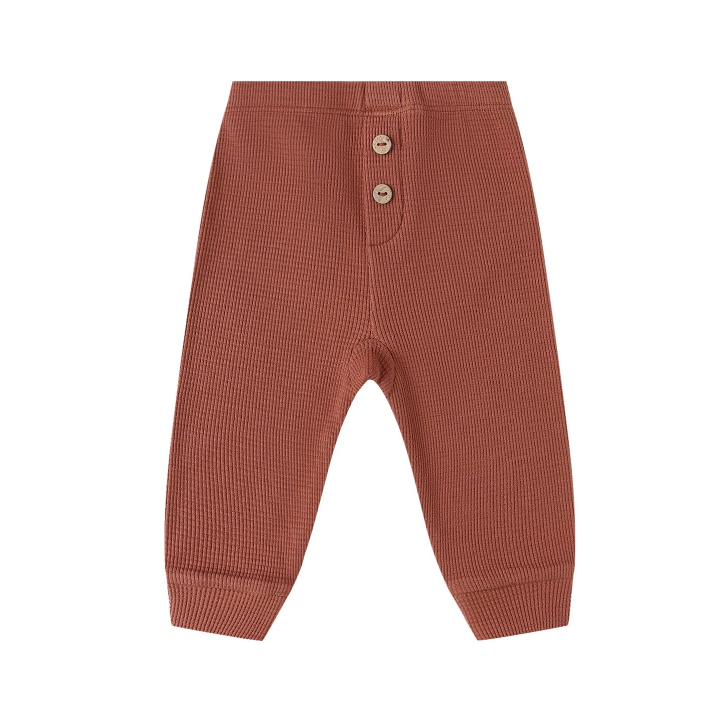 Brick red waffle baby pants with buttons on a white background